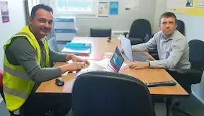 Two constructin managers in the office