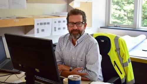 onstruction project management in the office at the desk