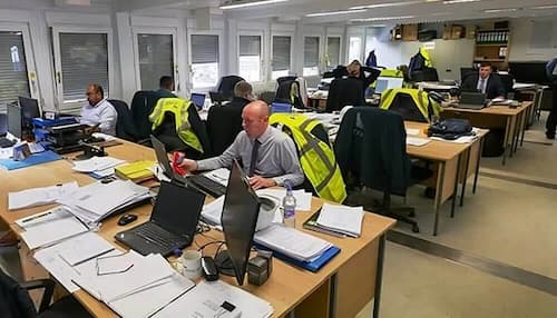 NVQ Level 6 site managers working in the site office